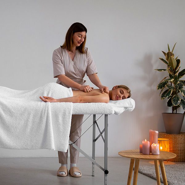 Massage therapist working with a client in Bryant, Arkansas